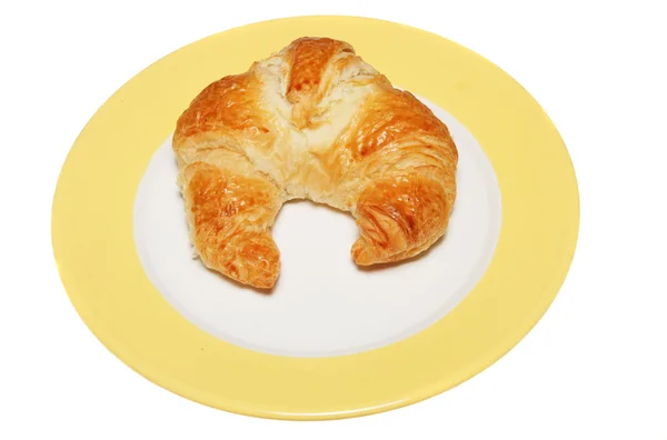 Croissant su piatto — Foto Stock