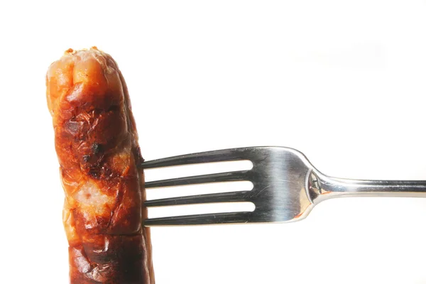 Sausage on fork — Stock Photo, Image