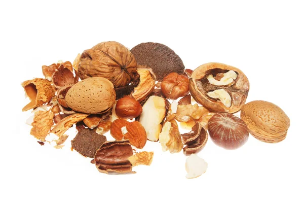 Whole and cracked nuts — Stock Photo, Image