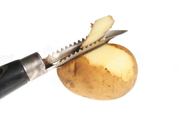 Peeling aardappel — Stockfoto