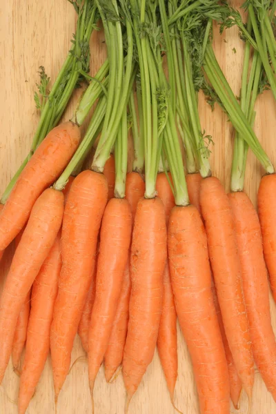 Carrots on board — Stock Photo, Image