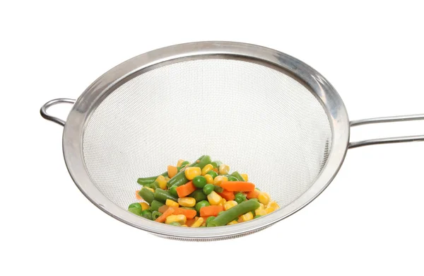 Mixed vegetables in a sieve — Stock Photo, Image