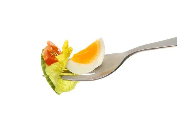 Ägg och sallad på gaffeln — Stockfoto