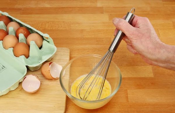 Hand whisking egs — Stock Photo, Image