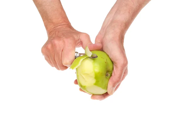 Hands peeling apple — Stock Photo, Image