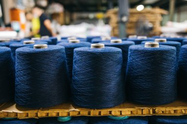 Cotton yarns or threads on spool tube bobbins at cotton yarn factory