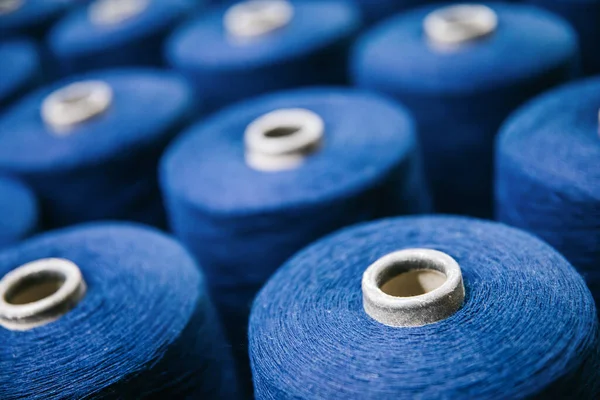 Cotton yarns or threads on spool tube bobbins at cotton yarn factory