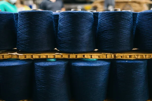 Cotton yarns or threads on spool tube bobbins at cotton yarn factory