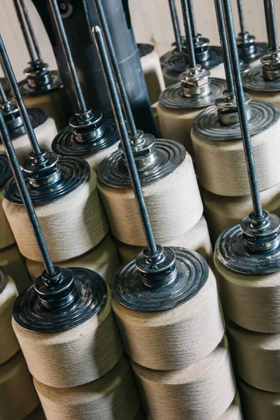Cotton yarns or threads on spool tube bobbins at cotton yarn factory