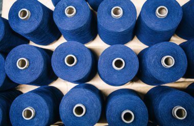 Cotton yarns or threads on spool tube bobbins at cotton yarn factory