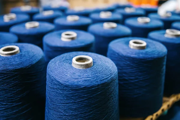 Cotton yarns or threads on spool tube bobbins at cotton yarn factory