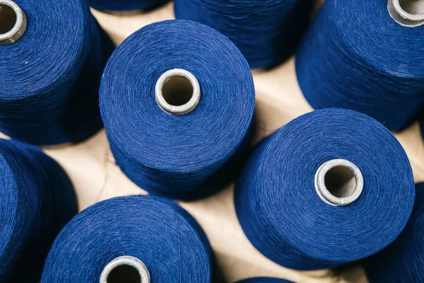 Cotton yarns or threads on spool tube bobbins at cotton yarn factory