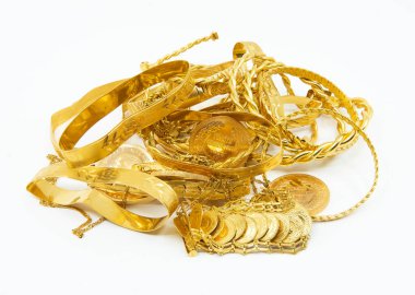 Heap or stack of variety traditional Turkish scrap gold and coins isolated on white background