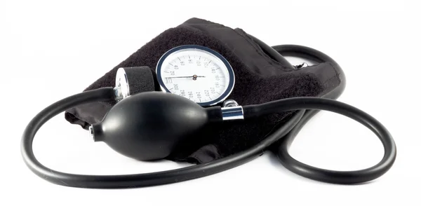 El dispositivo para medir la presión arterial aislado sobre un fondo blanco Fotos de stock