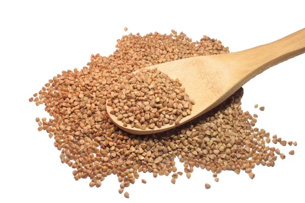 Buckwheat in wood spoon — Stock Photo, Image