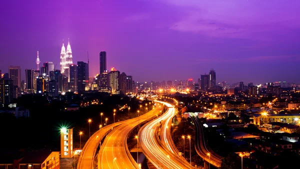 Light trail at the busy highway — Stock Photo, Image