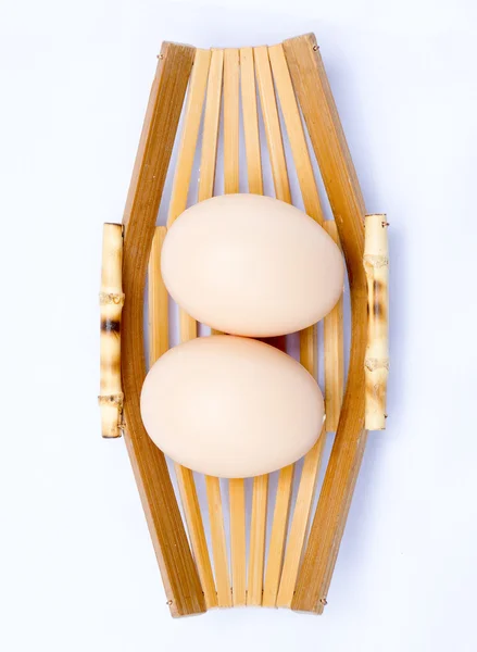 Egg in basket — Stock Photo, Image