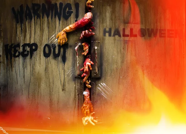 Zombie hand through the door, useful for some Halloween concept — Stock Photo, Image