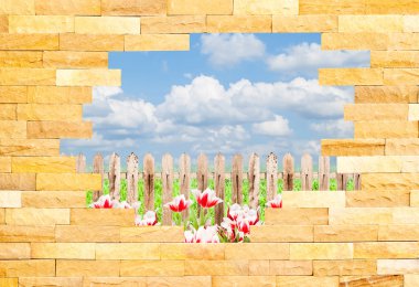 Crashed Brick Wall with beautiful landscape behi clipart