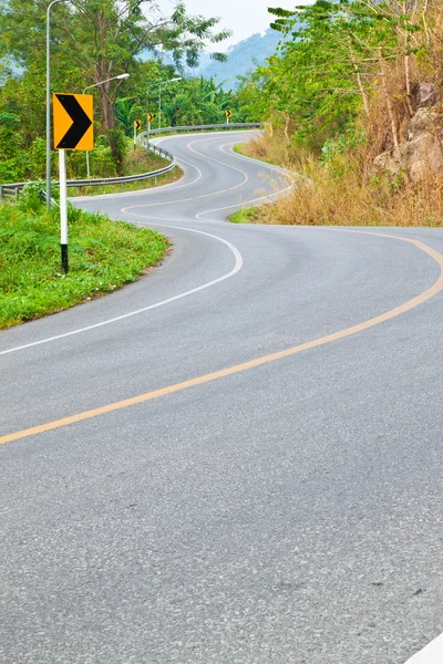 The road curves up the mountain,countryside of Thailand