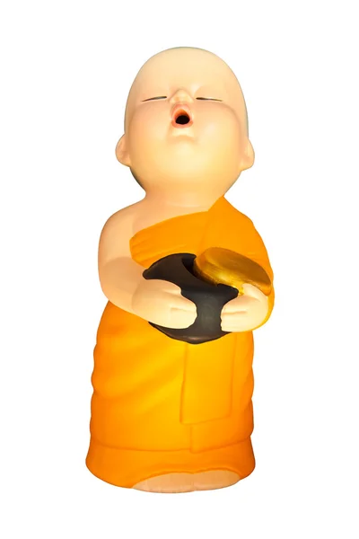 Bambola argilla bambino monaco con elemosina ciotola isolato su sfondo bianco — Foto Stock