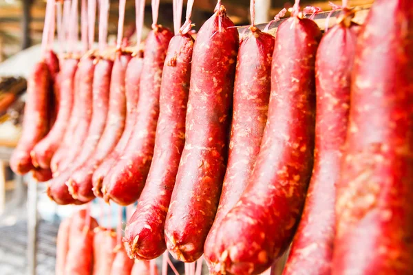 Home made meat salami sausage at street market hanging in line u — Stock Photo, Image