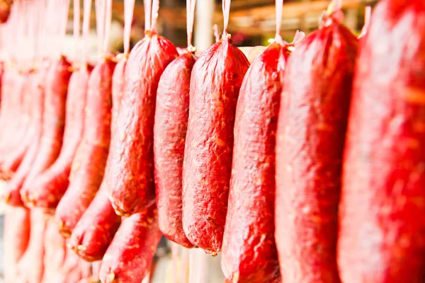 Home made meat salami sausage at street market hanging in line u — Stock Photo, Image