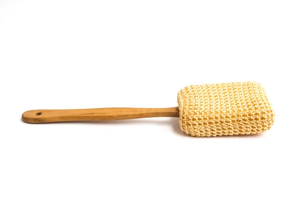 Loofah longo lidar com escova traseira no chão traseiro branco — Fotografia de Stock