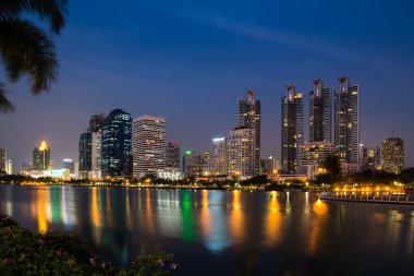 Bangkok city downtown at night with reflection of skyline, Bangk clipart