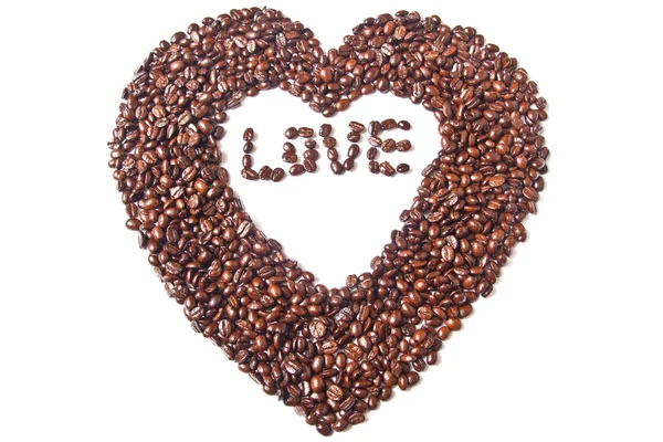 Srdce z hnědé kávová zrna a slovo lásky — Stock fotografie