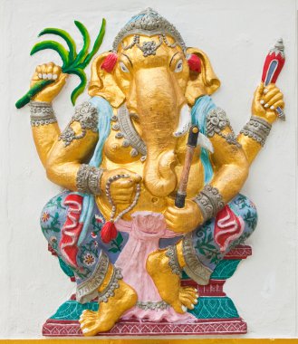 Indian or Hindu ganesha God Named Yoga Ganapati at temple in tha clipart