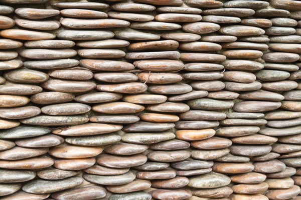 Cirkel pebble muur, abstracte achtergrond — Stockfoto