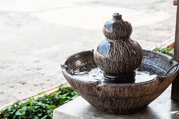 Jar fountain decorated home garden — Zdjęcie stockowe