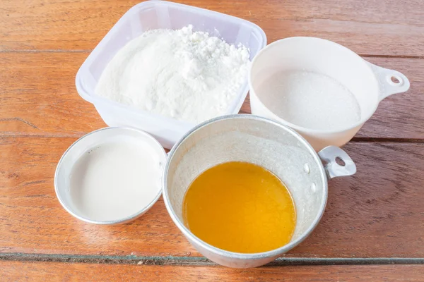 Set of baking ingredients flour, butter, sugar and milk — Stock Photo, Image