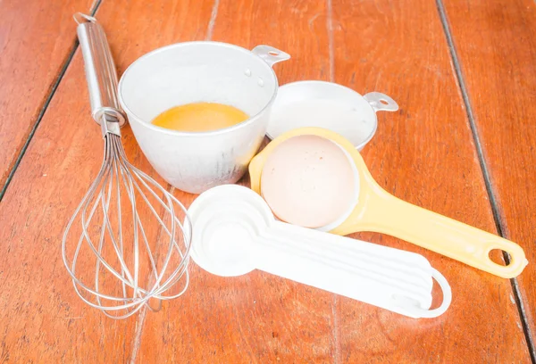 Step of bakery preparation with milk, butter, spoon, hand mixer — Stock Photo, Image