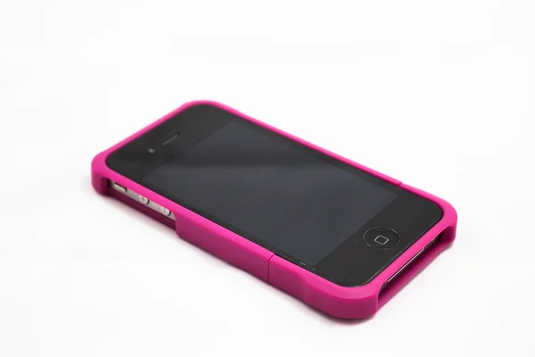 Beautiful black smartphone in pink case isolated on white — Stock Photo, Image