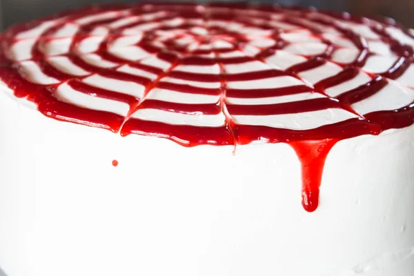 Rasberry sauce decorated home made whipped cream cake — Stock Photo, Image