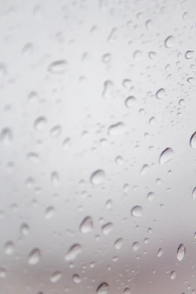 Veritable rain drops outside window of air plane — Stock Photo, Image