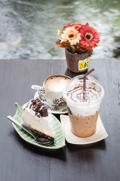 Coffee latte and cheese cake in zen garden