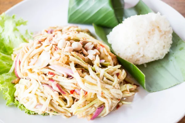 Mango spicy salad and sticky rice — Stock Photo, Image