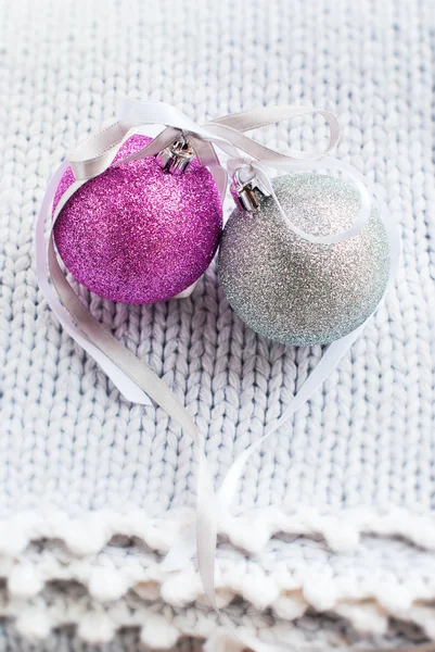 Christmas Card with Two Brilliant Balls on the Knitted Blanket — Stock Photo, Image