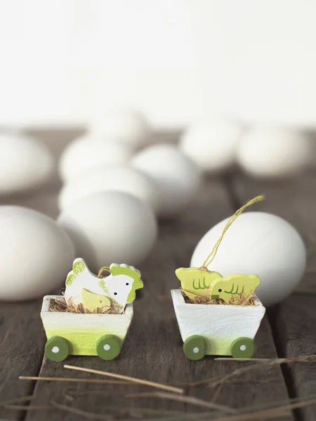 Toy Chickens in front of Eggs — Stock Photo, Image