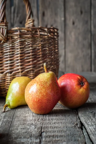 Composition with Pears on the dark wooden table — Stock Photo, Image