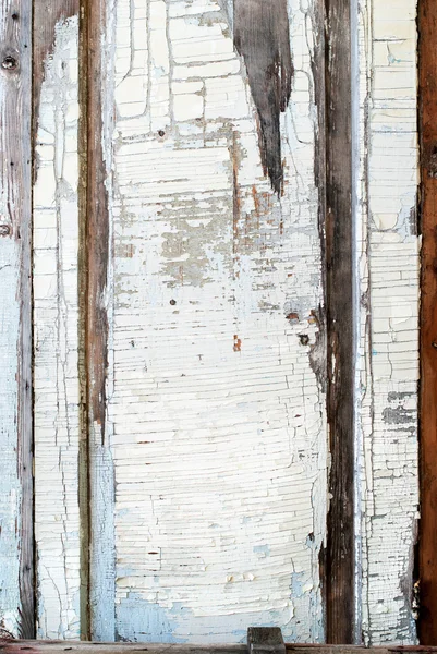 Panel blanco viejo con pintura agrietada, fondo — Foto de Stock