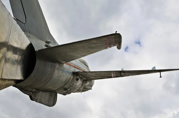 Old aircraft MiG-21 monument on city street — Stock Photo, Image