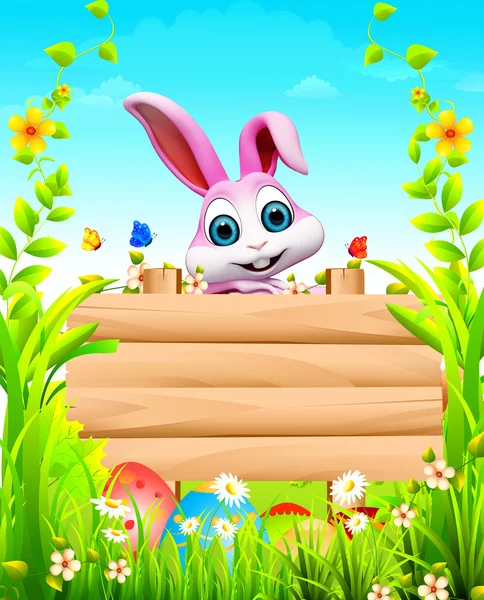 Happy enjoying bunny with wooden sign — Stock Photo, Image