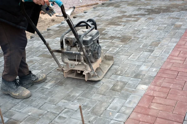 Road Service Worker Compacts Asphalt Fenced Road Section Roadway Vibration — 图库照片#