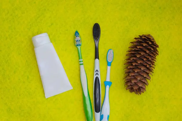 Toothbrushes Yellow Background Health Care Dental Hygiene Space Text Top — Stock Photo, Image