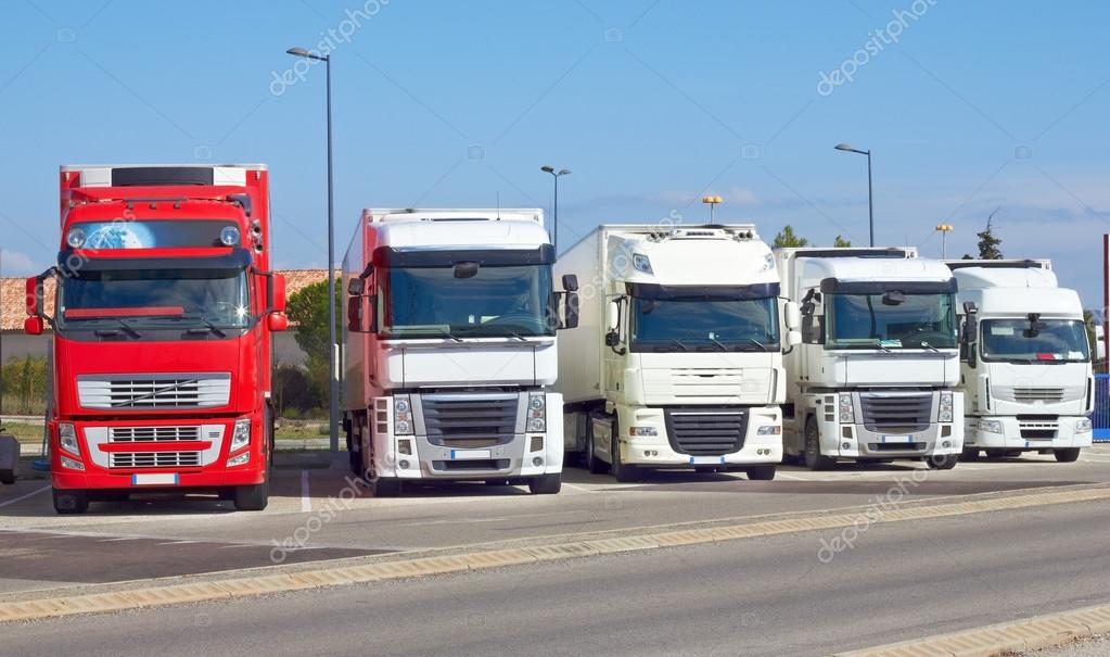 Trucks in a row ⬇ Stock Photo, Image by © Portumen #15274587 Trucks in a row