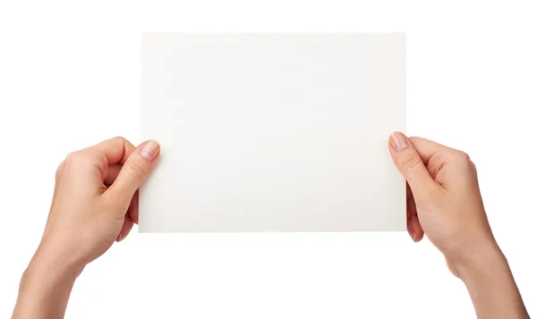 Hand holding blank paper isolated on white background with clipping path,  Poster Mockup. Stock Photo